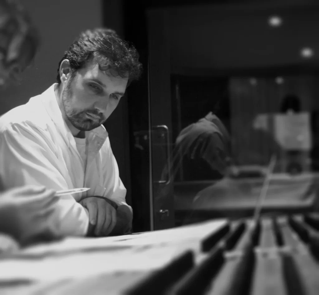 Black and white photograph of David Felaris in studio